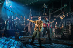 Andrew Durand with the company of The Curious Case of Benjamin Button at The Public Theater. Photo by Joan Marcus