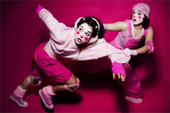 Xhloe and Natasha in pink clown make-up in key art for Bigfoot Ripped My Dog In Half I Saw It