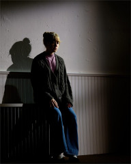 Susannah Flood alone in a pool of light in Pre-Existing Condition. Photo by Austin Ruffer
