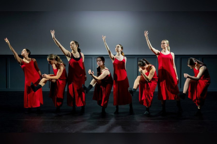 Dancers in red dresses in Concede What Remains, one of the works at Spark Theatre Festival NYC. Photo by Kevin Backman
