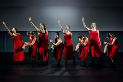 Dancers in red dresses in Concede What Remains, one of the works at Spark Theatre Festival NYC. Photo by Kevin Backman