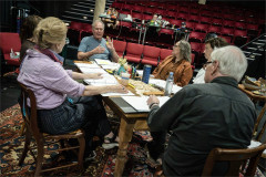 The company of We'll See in rehearsal with playwright and director Richard Nelson at The Public Theater. Photo by Joan Marcus