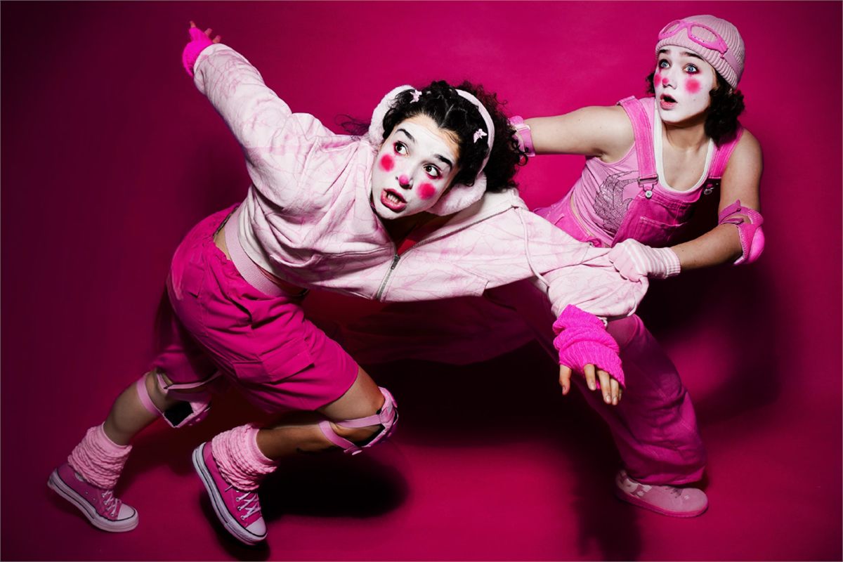 Xhloe and Natasha in pink clown make-up in key art for Bigfoot Ripped My Dog In Half I Saw It