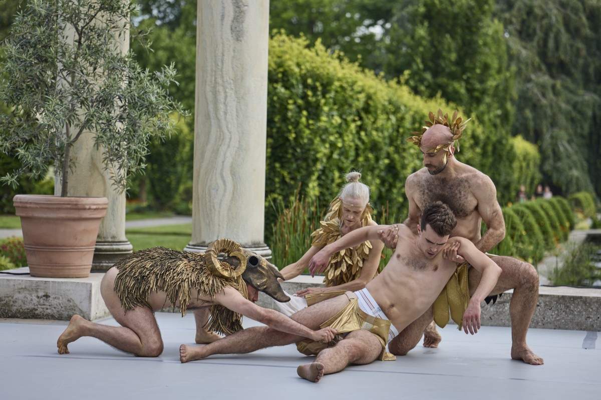 Dancers in gold costumes in Christopher Williams’s La Rhétorique des Dieux, performed at Untermyer Gardens in 2025
