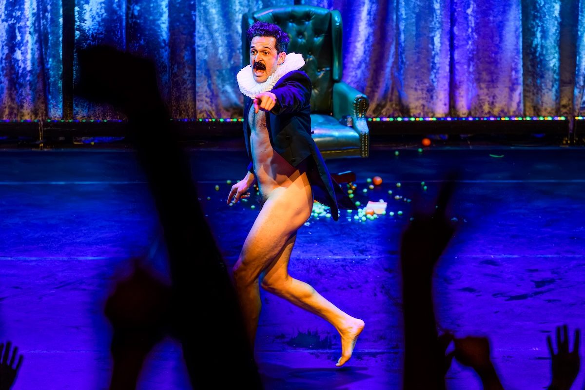 Damien Warren-Smith as Garry Starr runs across the stage in Garry Starr: Classic Penguins at Studio Seaview. Photo by Austin Ruffer