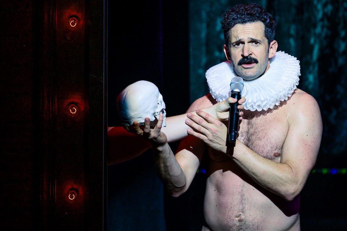 Damien Warren-Smith as Garry Starr with a skull in Garry Starr: Classic Penguins at Studio Seaview. Photo by Austin Ruffer