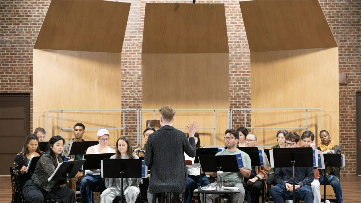 The choir of I Became We rehearsing at Atlantic Theater Company. Photo by Ahron R. Foster The choir of I Became We rehearsing at Atlantic Theater Company. Photo by Ahron R. Foster
