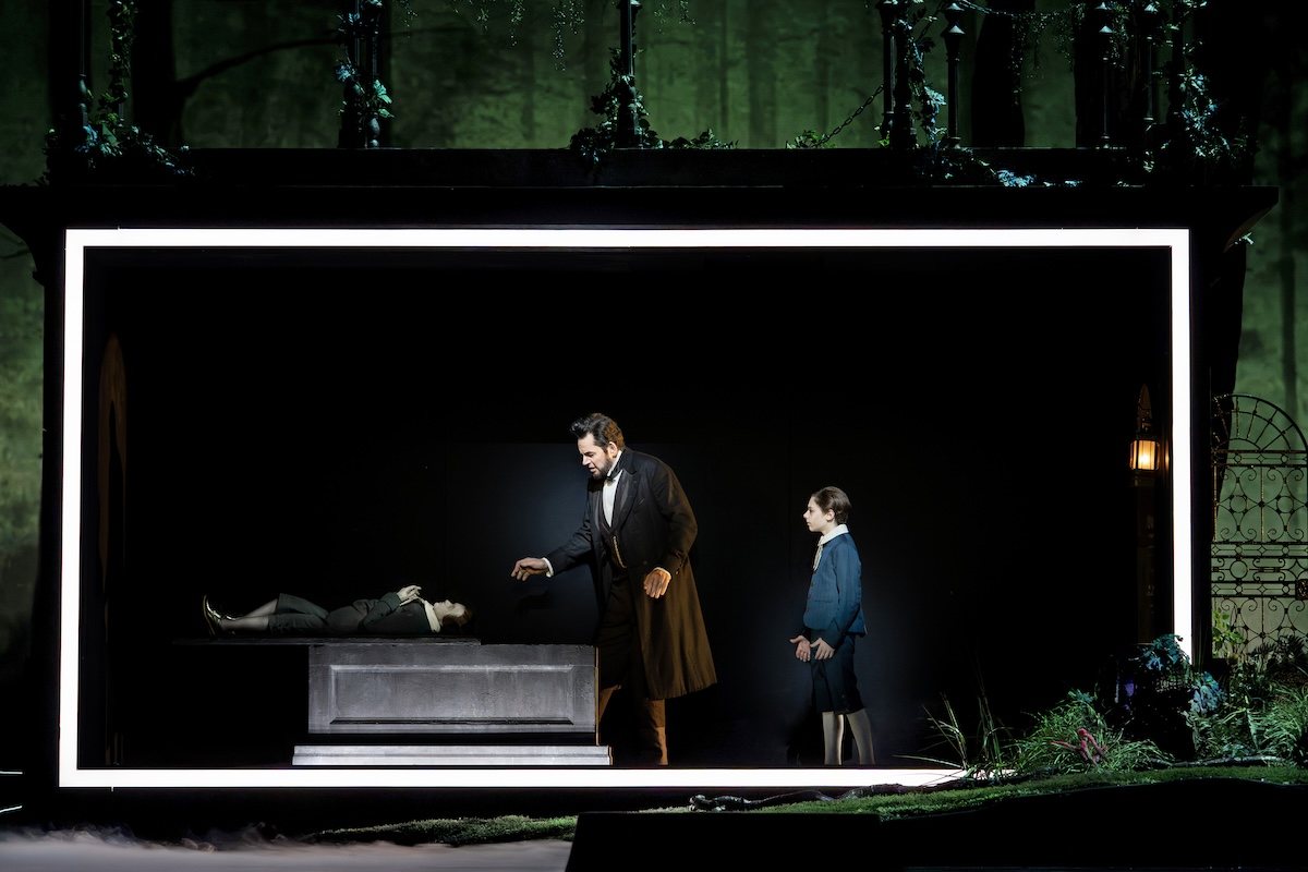 Peter Mattei as Abraham Lincoln and Everett Sobers as Willie in Lincoln in the Bardo at the Metropolitan Opera. Photo by Karen Almond / Met Opera
