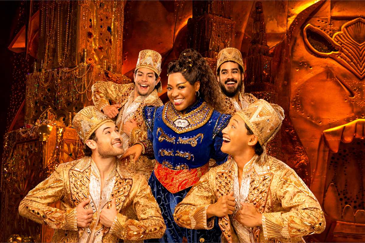 Sherri Shepherd as the Genie with members of the company of Aladdin on Broadway. Photo by Evan Zimmerman for MurphyMade