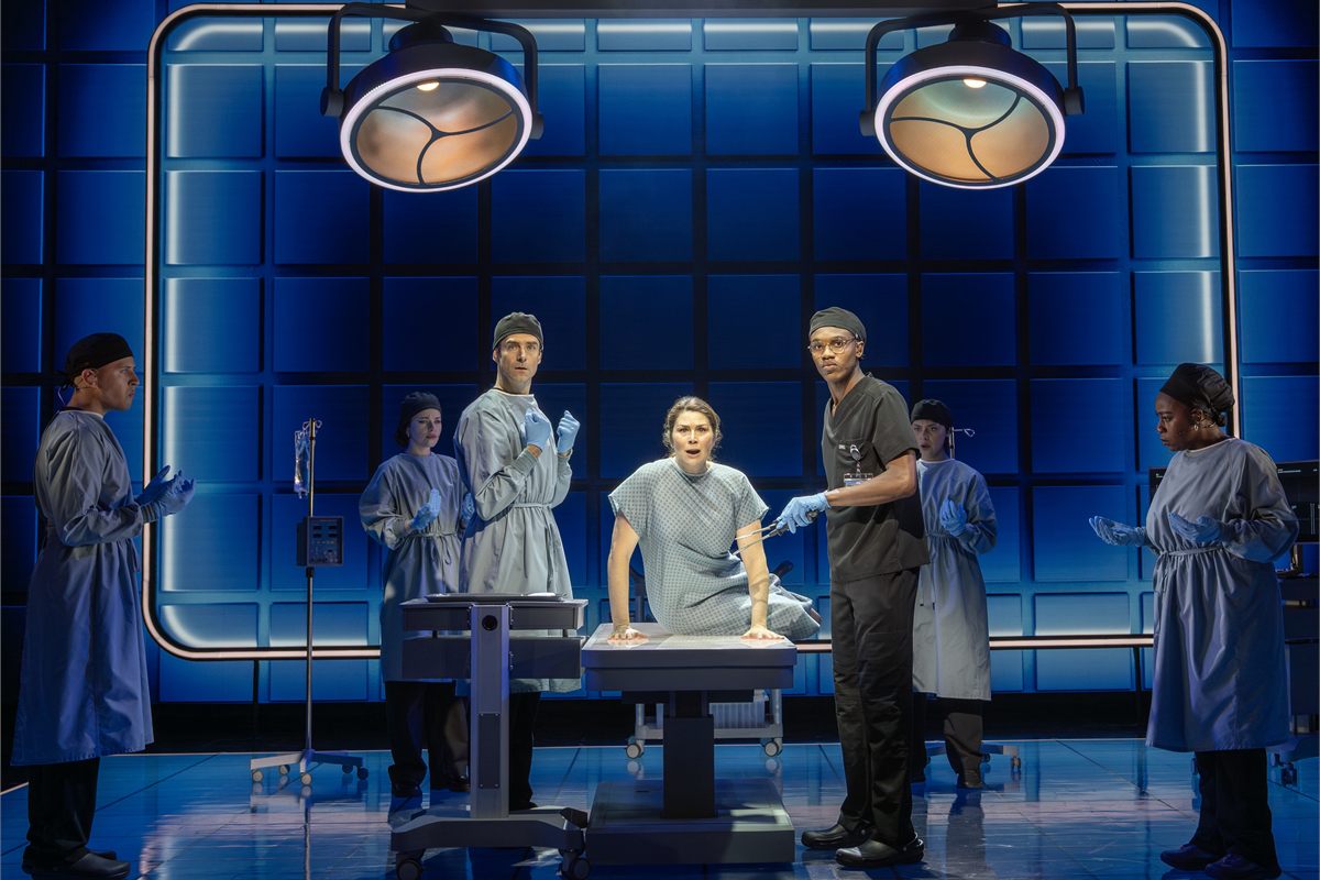 Drew Gehling, Heidi Blickenstaff, Nick T. Daly and the company of The Heart at the Laura Pels Theatre. Photo by Joan Marcus
