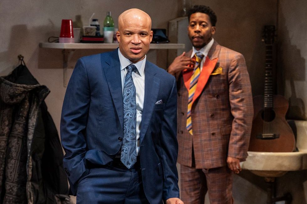 Glenn Davis and Namir Smallwood in suits in Topdog/Underdog. Photo by Michael Brosilow
